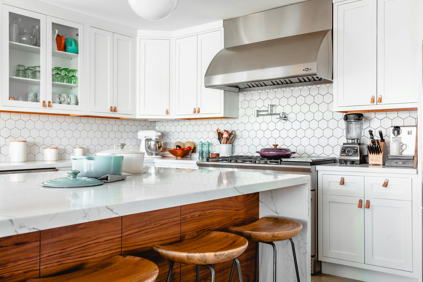 Bright kitchen with a spacious island and warm natural finishes